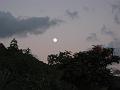 Moon rising during sunset